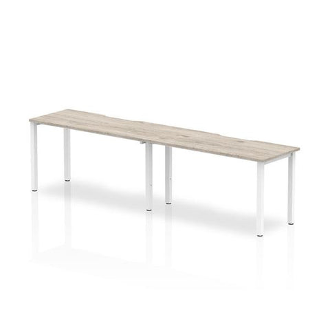 Dynamic Evolve Plus Single Row (Dynamic Evolve Plus 1400mm Single Row 2 Person Desk Grey Oak Top White Frame BE768 DD)